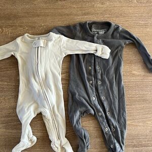 Loved Baby footies - one is size preemie/ NB and other is size 0-3 months